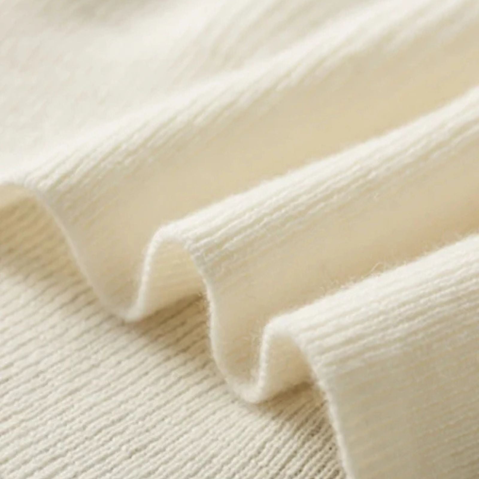 The Lausanne Cashmere Tailored Button Sweater