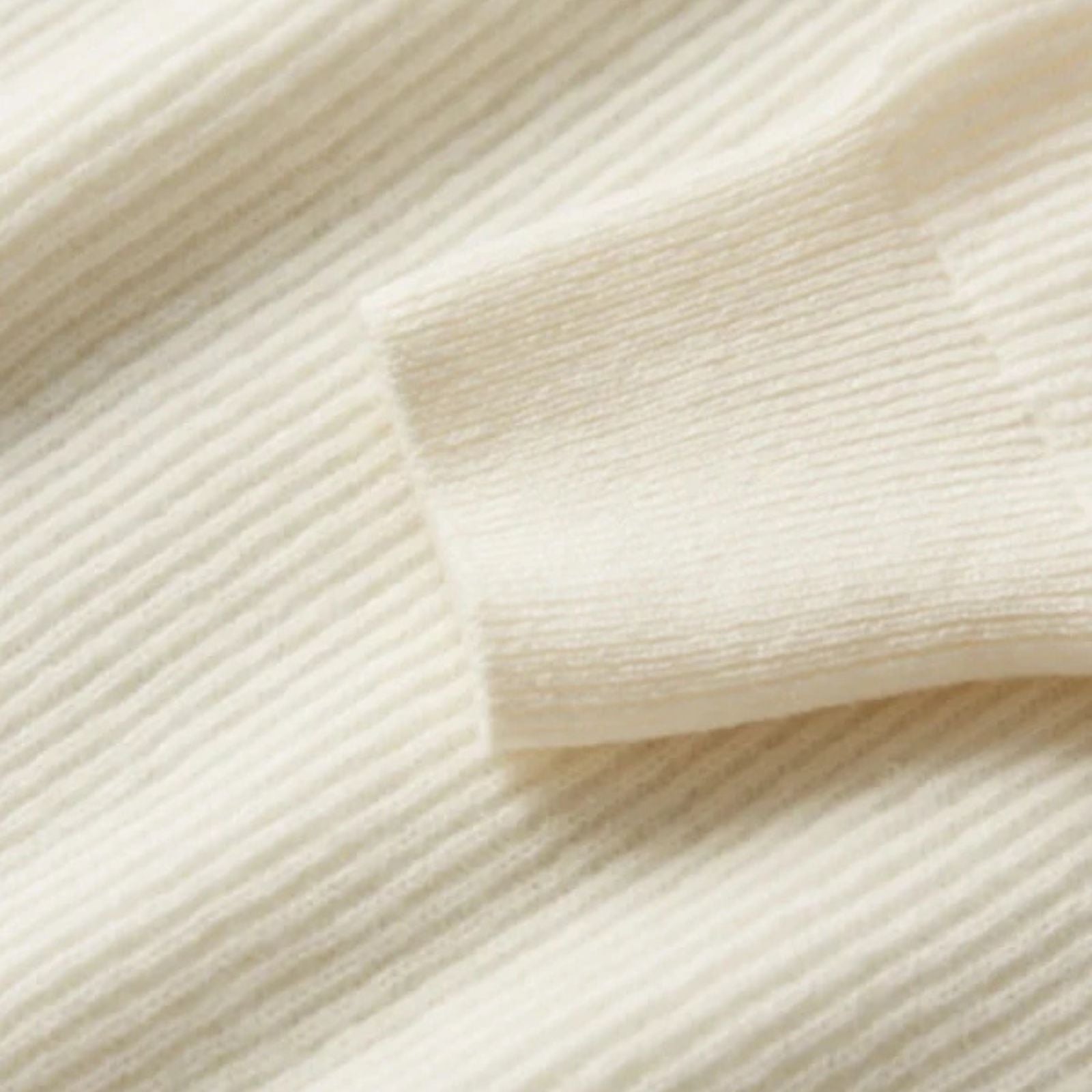 The Lausanne Cashmere Tailored Button Sweater